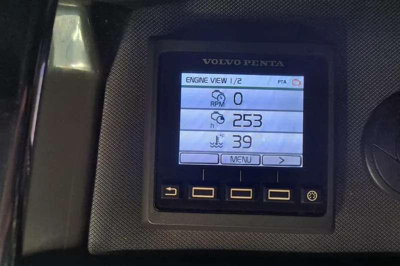 Slide: The Image of Volvo Penta engine display on 2017 Monterey 355 Sport Yacht showing RPM, hours, and temperature. - 69