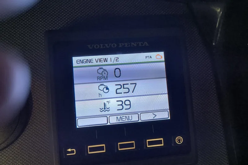 Slide: The Image of Volvo Penta engine display on 2017 Monterey 355 Sport Yacht showing RPM, hours, and temperature. - 70