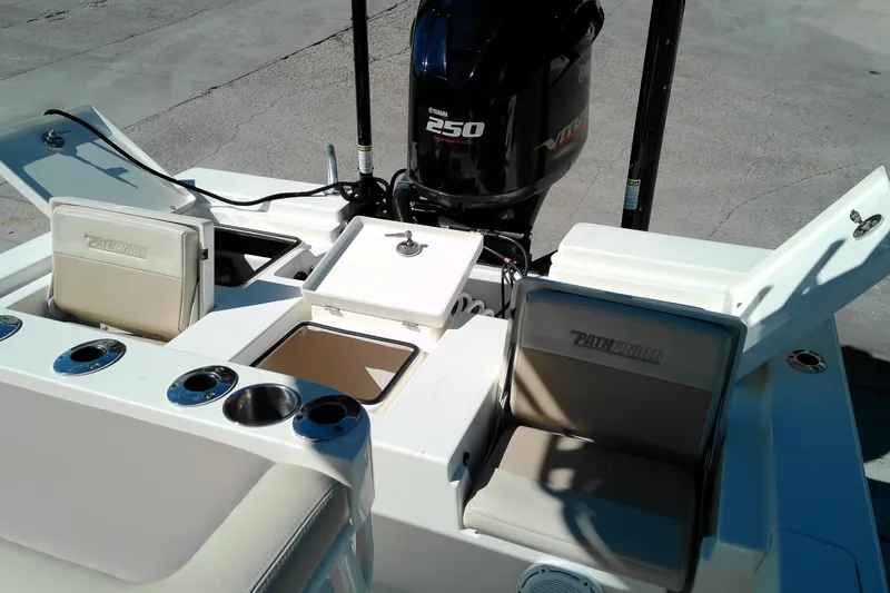 Slide: The Image of 2016 Pathfinder 2200 T boat interior with Yamaha 250 engine, seating, and storage compartments. - 15
