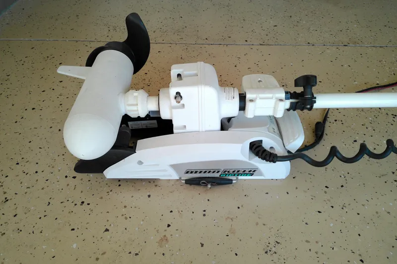 Slide: The Image of Minn Kota trolling motor on a speckled floor, compatible with 2016 Pathfinder 2200 T. - 30