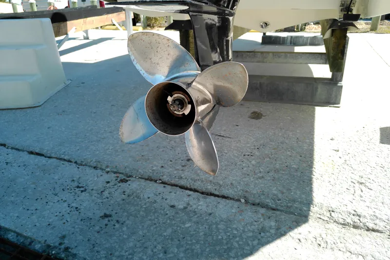 Slide: The Image of Propeller of a 2016 Pathfinder 2200 T boat on a concrete surface. - 6