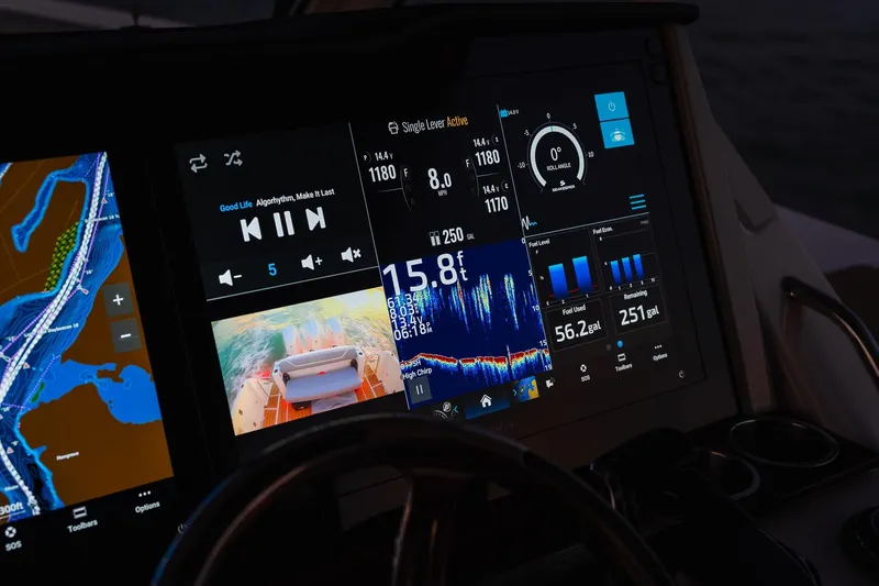 Slide: The Image of Dashboard of 2025 Regal 38 SAV boat with navigation and control displays. - 16