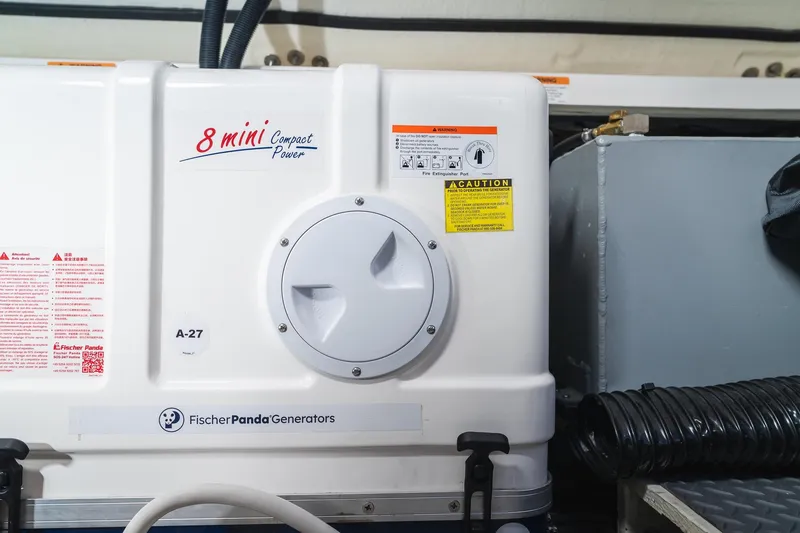 Slide: The Image of Fischer Panda generator in 2025 Regal 38 SAV boat, featuring 8 Mini Compact Power. - 19