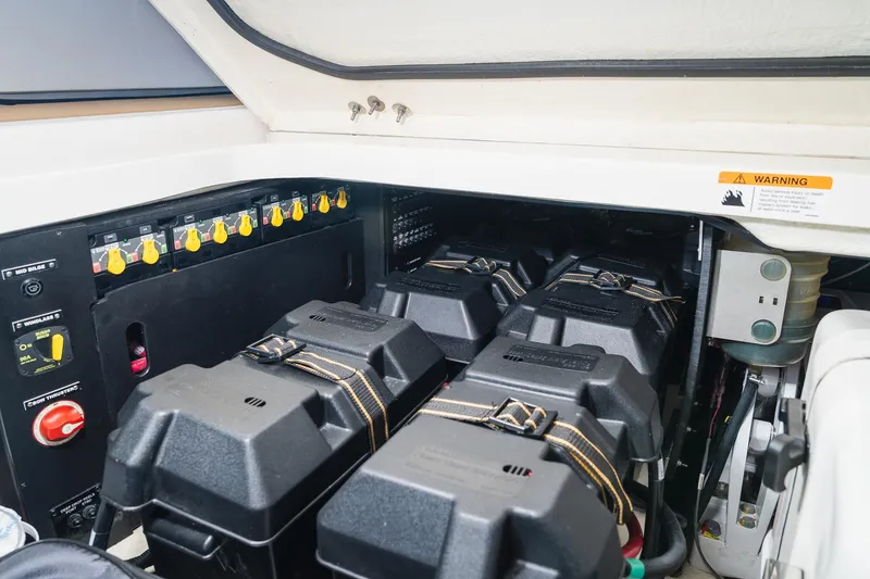 Slide: The Image of 2025 Regal 38 SAV engine compartment with battery storage and control panel. - 20