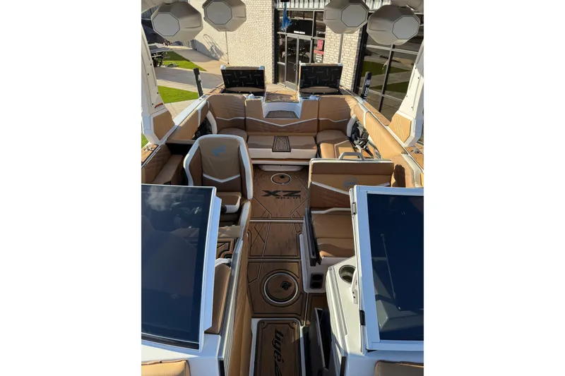 Slide: The Image of 2024 Tigé Ultré 23ZX boat interior with luxurious seating and modern design. - 11