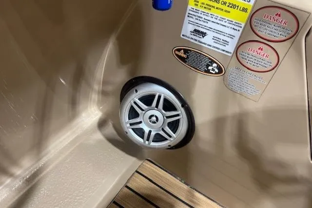 Slide: The Image of Speaker and warning labels inside 2015 Harris Solstice 240 boat. - 18