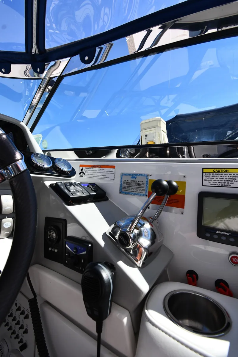 Slide: The Image of 2008 Formula 400 Super Sport boat cockpit controls. - 17