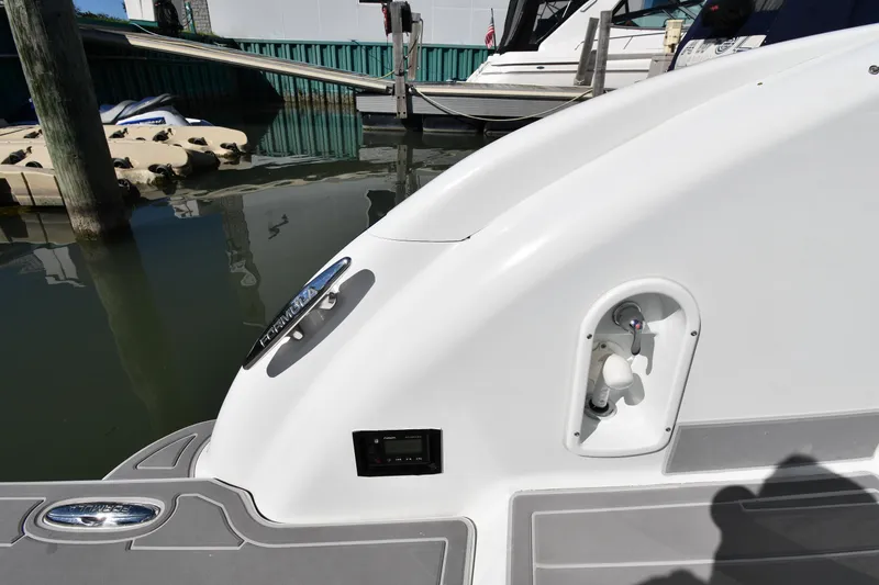 Slide: The Image of Rear view of a 2008 Formula 400 Super Sport yacht at dock. - 28