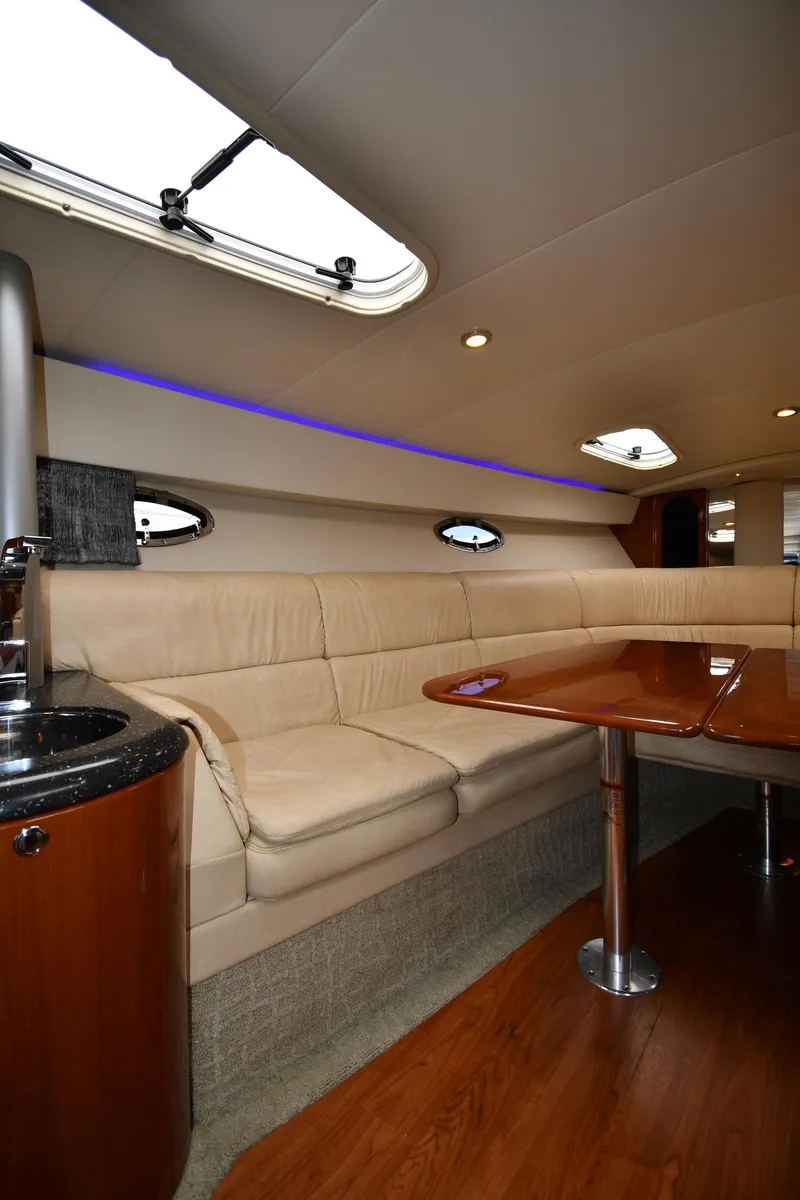 Slide: The Image of 2008 Formula 400 Super Sport yacht interior with seating and table. - 37