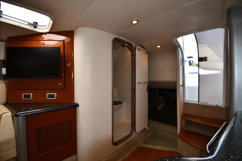 Slide: The Image of Interior of 2008 Formula 400 Super Sport yacht with TV and stairs. - 46