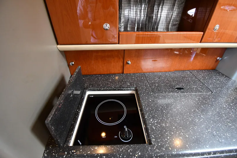 Slide: The Image of Kitchen area in 2008 Formula 400 Super Sport boat. - 49