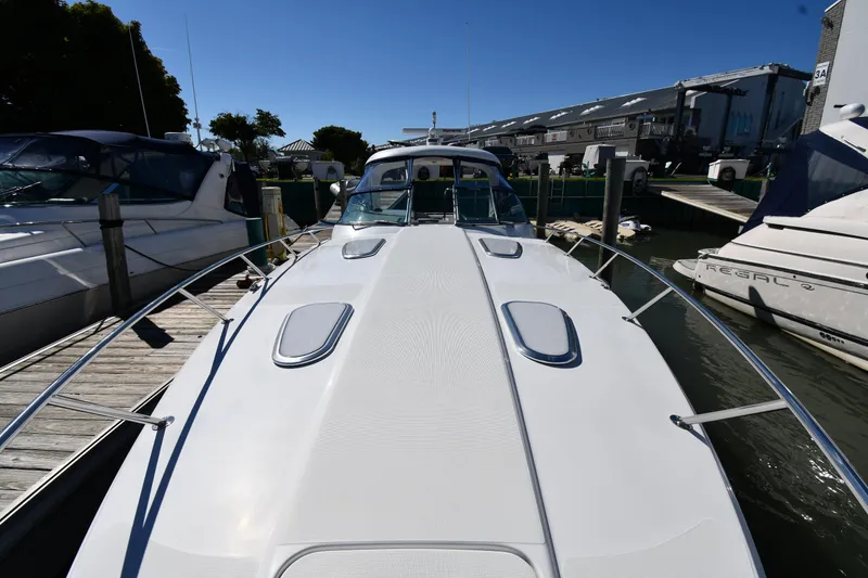 Slide: The Image of 2008 Formula 400 Super Sport boat docked at marina. - 6