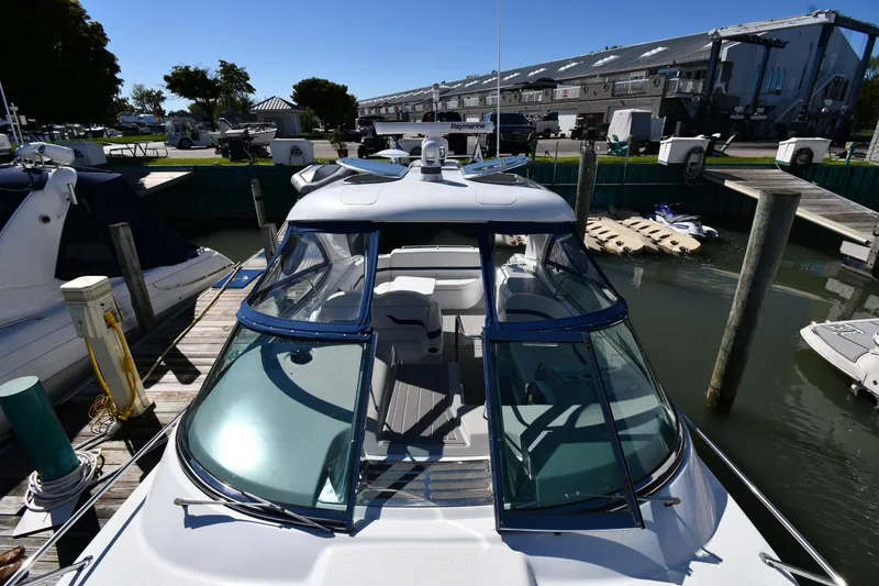 Slide: The Image of 2008 Formula 400 Super Sport boat docked at marina. - 8