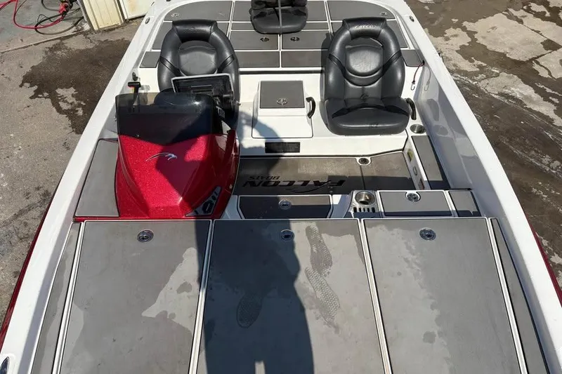 Slide: The Image of 2021 Falcon Boats F205 interior with dual seats and red console. - 7