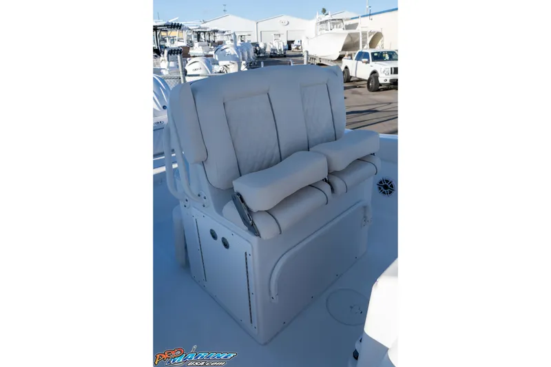 Slide: The Image of Luxurious seating on 2026 Sea Hunt Ultra 265 SE boat, featuring plush cushions. - 23