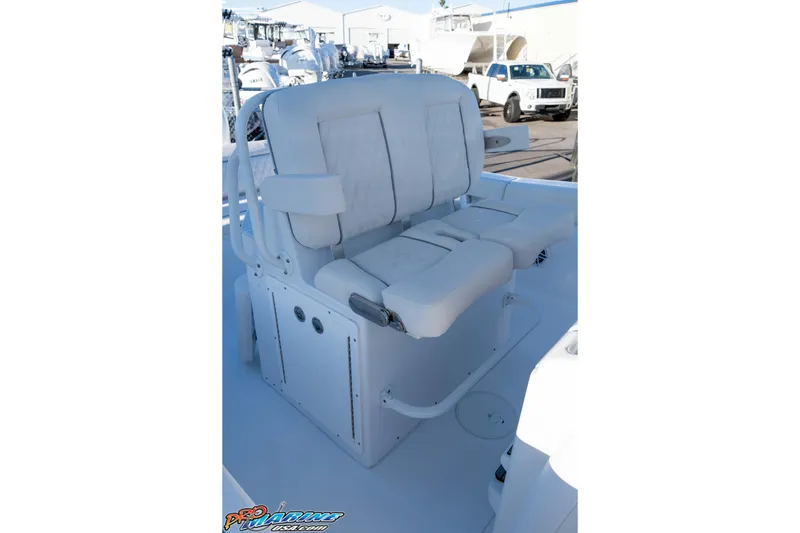 Slide: The Image of Luxury seating on 2026 Sea Hunt Ultra 265 SE boat, featuring plush white cushions. - 24