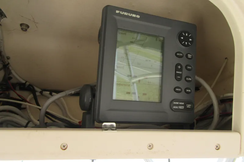 Slide: The Image of Furuno marine radar display on 2004 Grady-White Seafarer 228 boat dashboard. - 38
