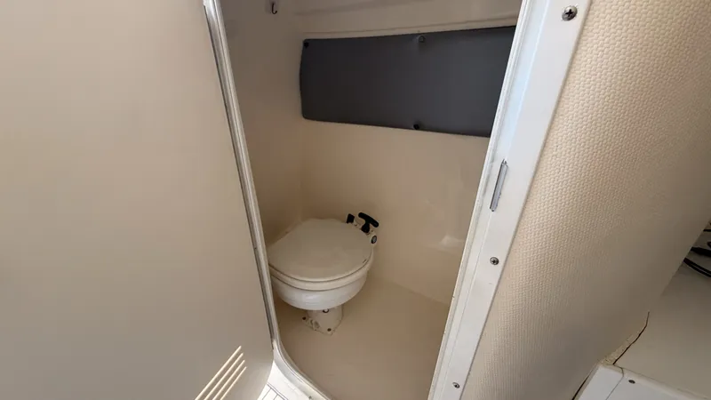 Slide: The Image of Interior of 2014 Pronautica 33 Sport featuring a toilet. - 10