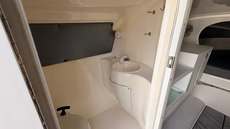 Slide: The Image of Interior of 2014 Pronautica 33 Sport with sink and storage. - 11