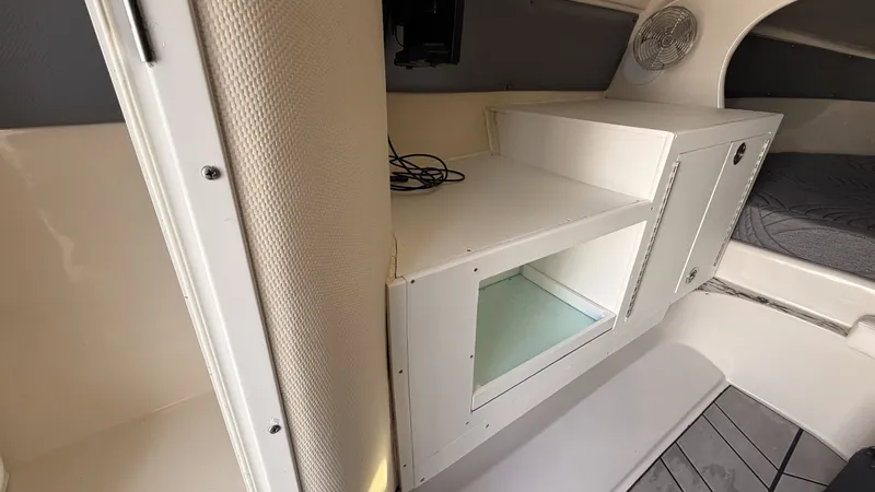 Slide: The Image of Interior of 2014 Pronautica 33 Sport with storage and bed. - 12