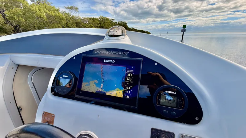 Slide: The Image of Pronautica 33 Sport 2014 with Simrad navigation system on calm waters. - 20