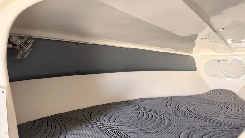 Slide: The Image of Interior of 2014 Pronautica 33 Sport with gray upholstery. - 5