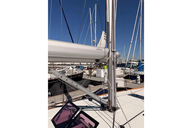 Slide: The Image of 2014 Jeanneau Sun Odyssey 469 sailboat mast and rigging in marina setting. - 14