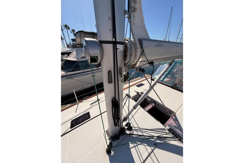 Slide: The Image of 2014 Jeanneau Sun Odyssey 469 sailboat mast and rigging in marina. - 24