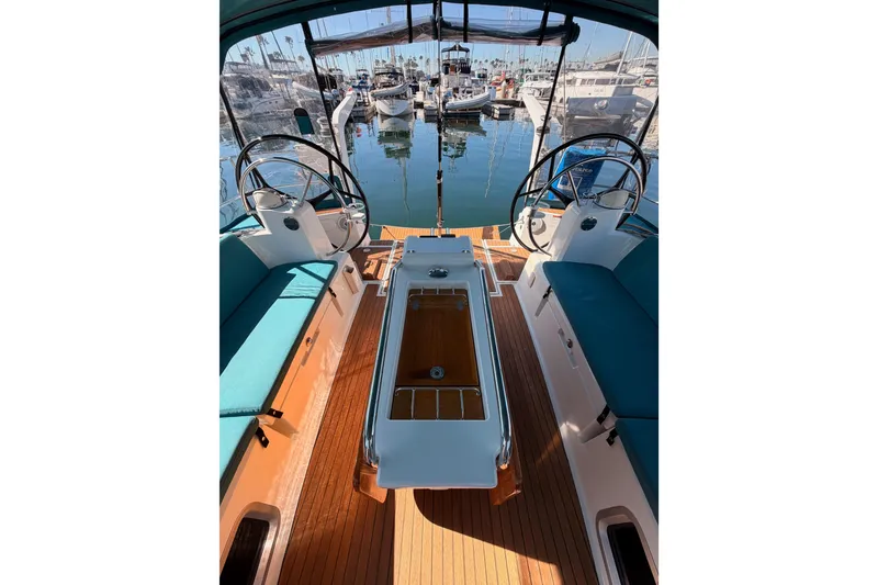 Slide: The Image of Cockpit view of 2014 Jeanneau Sun Odyssey 469 sailboat with dual steering wheels. - 29
