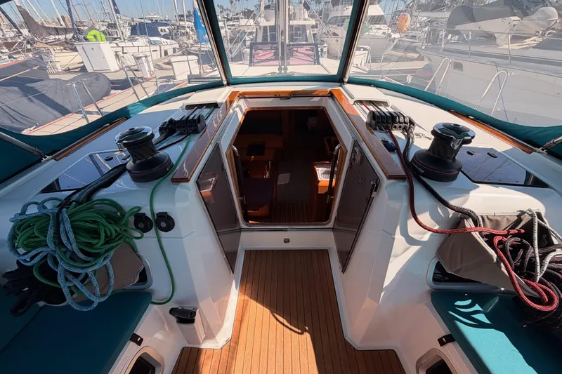 Slide: The Image of Cockpit view of 2014 Jeanneau Sun Odyssey 469 sailboat in marina. - 43