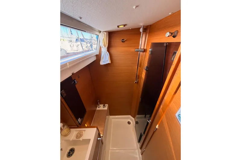 Slide: The Image of Bathroom interior of 2014 Jeanneau Sun Odyssey 469 yacht, featuring shower and sink. - 60