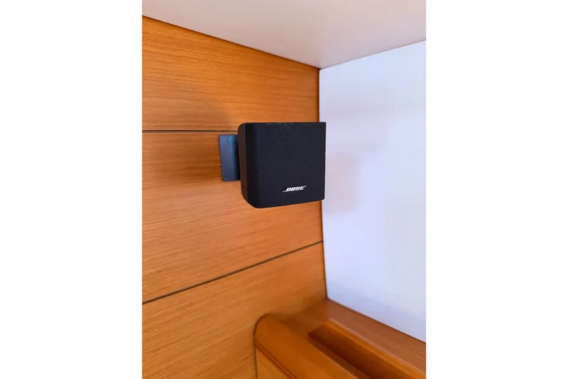 Slide: The Image of Bose speaker mounted on Jeanneau Sun Odyssey 469 yacht's wooden interior, 2014 model. - 78