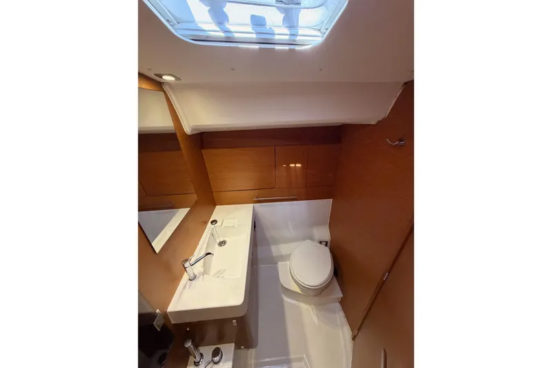 Slide: The Image of Interior of 2014 Jeanneau Sun Odyssey 469 yacht bathroom with modern fixtures and skylight. - 89