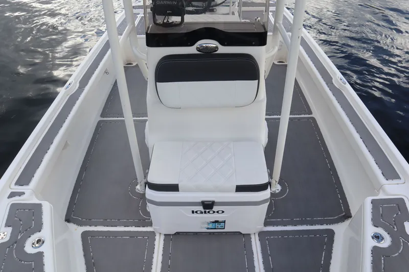 Slide: The Image of Interior view of a 2019 Mako 21 LTS boat with Igloo cooler. - 6