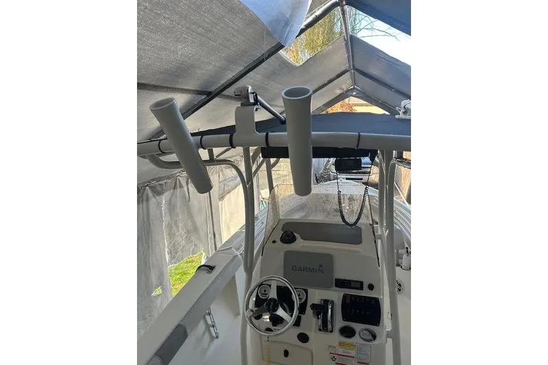 Slide: The Image of 2023 Mako 214 Center Console boat interior with Garmin navigation system. - 4