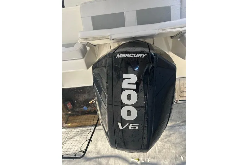 Slide: The Image of Mercury 200 V6 outboard motor on 2023 Mako 214 Center Console boat. - 5