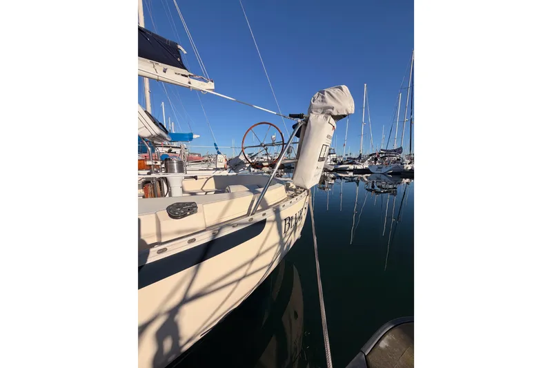 Slide: The Image of Sailboat docked in marina, Pacific Seacraft 34, 1995 model, clear blue sky. - 13
