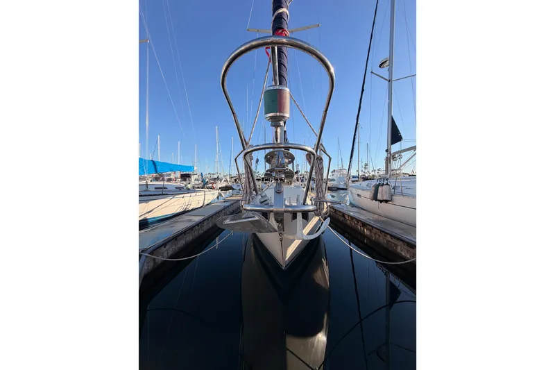 Slide: The Image of Sailboat docked in marina, Pacific Seacraft 34, 1995 model, clear blue sky. - 7