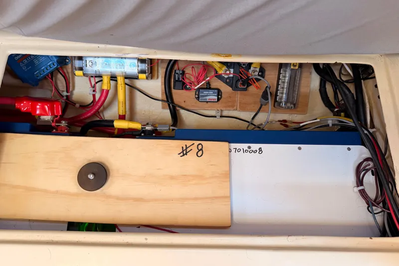 Slide: The Image of Electrical system of a 1995 Pacific Seacraft 34 sailboat, showcasing wiring and components. - 71