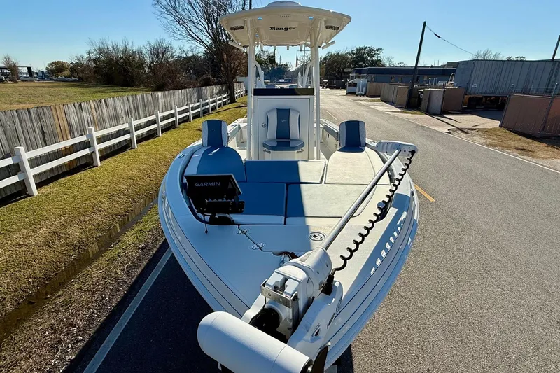 Slide: The Image of 2022 Ranger 2510 Bay boat with Garmin equipment on a sunny day. - 6