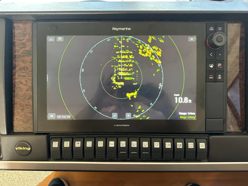 Slide: The Image of Radar display on 2007 Viking Sport Cruiser showing navigation data and controls. - 23