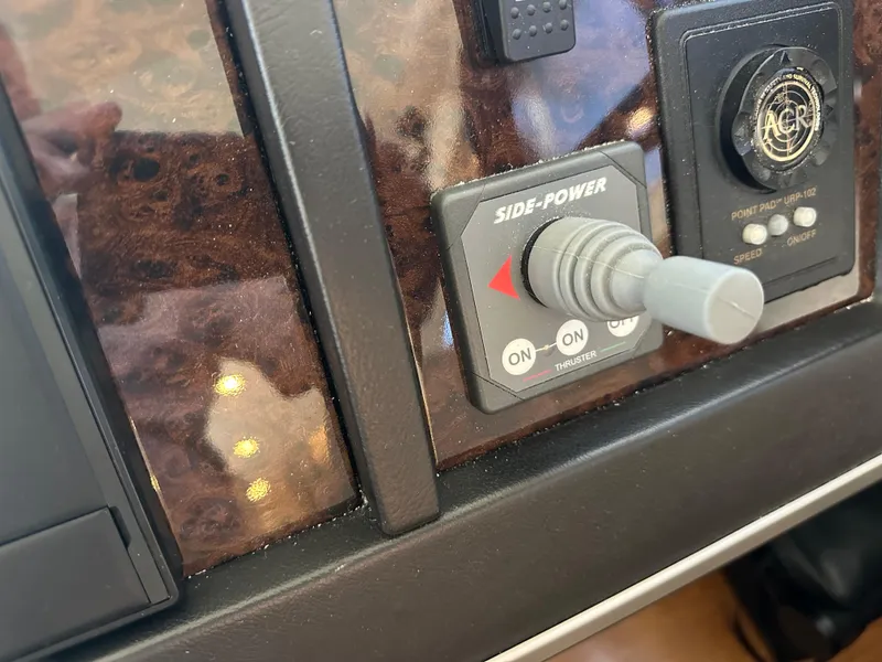 Slide: The Image of Control panel of a 2007 Viking Sport Cruiser with Side-Power thruster joystick. - 40