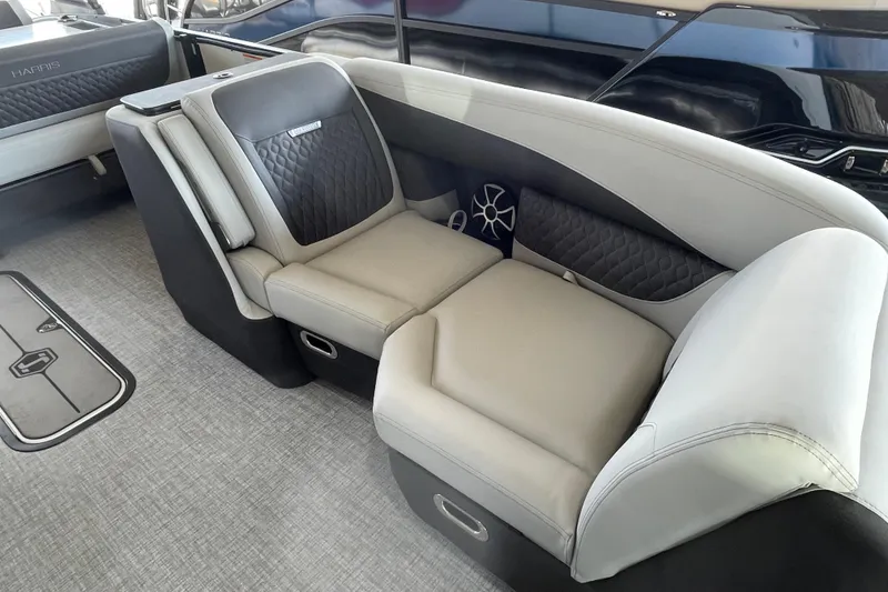 Slide: The Image of Luxurious seating on 2026 Harris Sunliner 230 boat, featuring modern design and comfortable upholstery. - 2