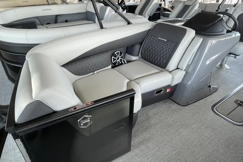 Slide: The Image of 2026 Harris Sunliner 230 boat interior with luxurious seating and modern design. - 3