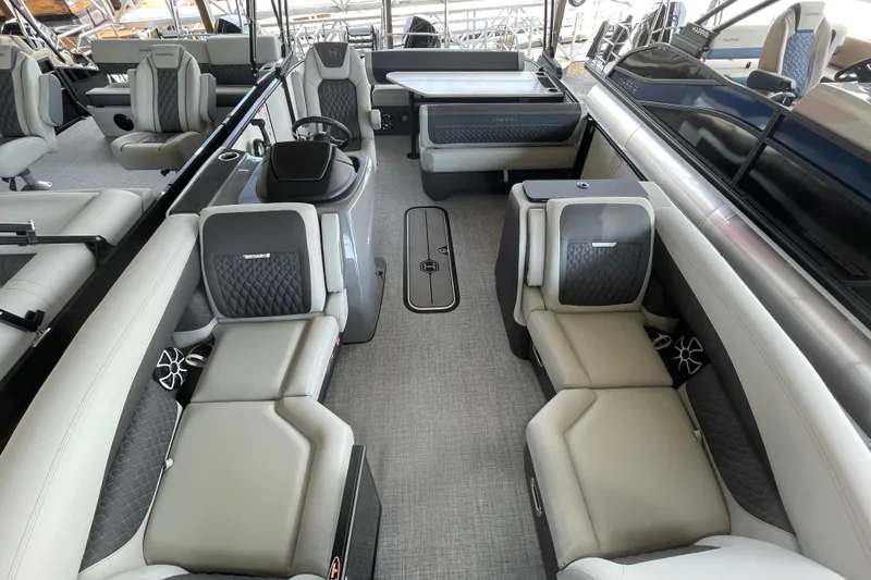 Slide: The Image of Luxurious interior of 2026 Harris Sunliner 230 pontoon boat with plush seating and modern design. - 4