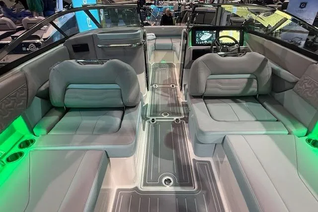 Slide: The Image of 2026 Regal LS6 Surf boat interior with modern seating and ambient lighting. - 15
