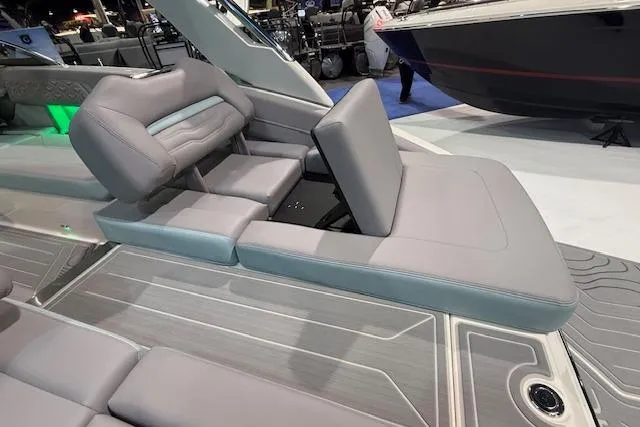 Slide: The Image of 2026 Regal LS6 Surf boat interior with luxurious gray seating and modern design. - 18