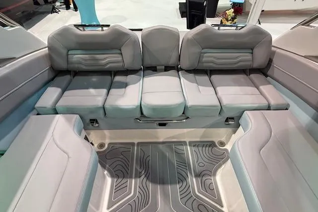 Slide: The Image of 2026 Regal LS6 Surf boat interior with luxurious gray seating and modern design. - 26