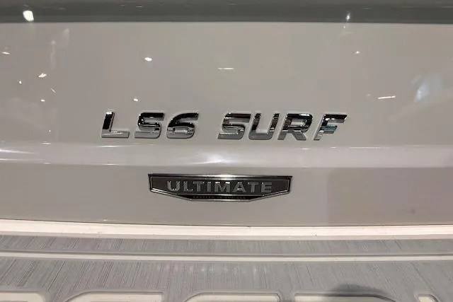 Slide: The Image of 2026 Regal LS6 Surf boat with "Ultimate" badge on rear. - 28