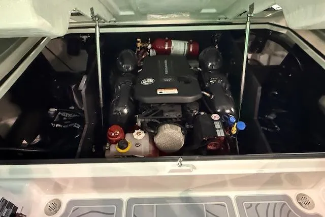 Slide: The Image of Engine compartment of 2026 Regal LS6 Surf boat, showcasing powerful engine components. - 30